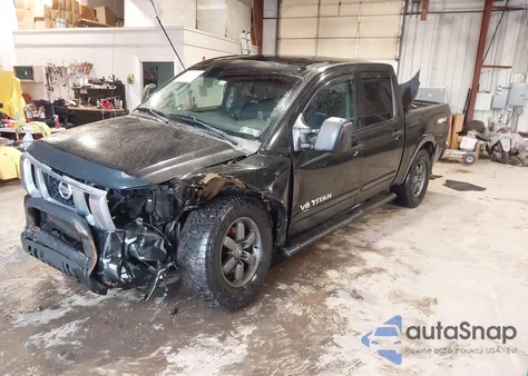 2015 Nissan Titan Pro-4X z USA, uszkodzony, nr VIN 1N6BA0EC7FN504238